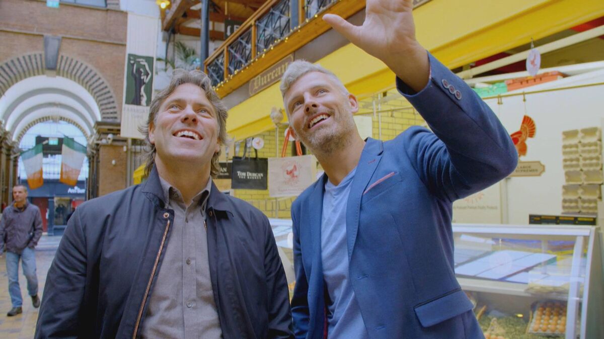 John Bishop and Des Bishop in the English Market, Cork, in 2019 for John Bishop’s Ireland. 