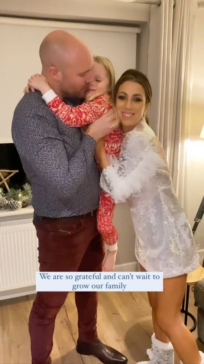 Georgie Crawford, husband Jamie and daughter Pia celebrate the good news 