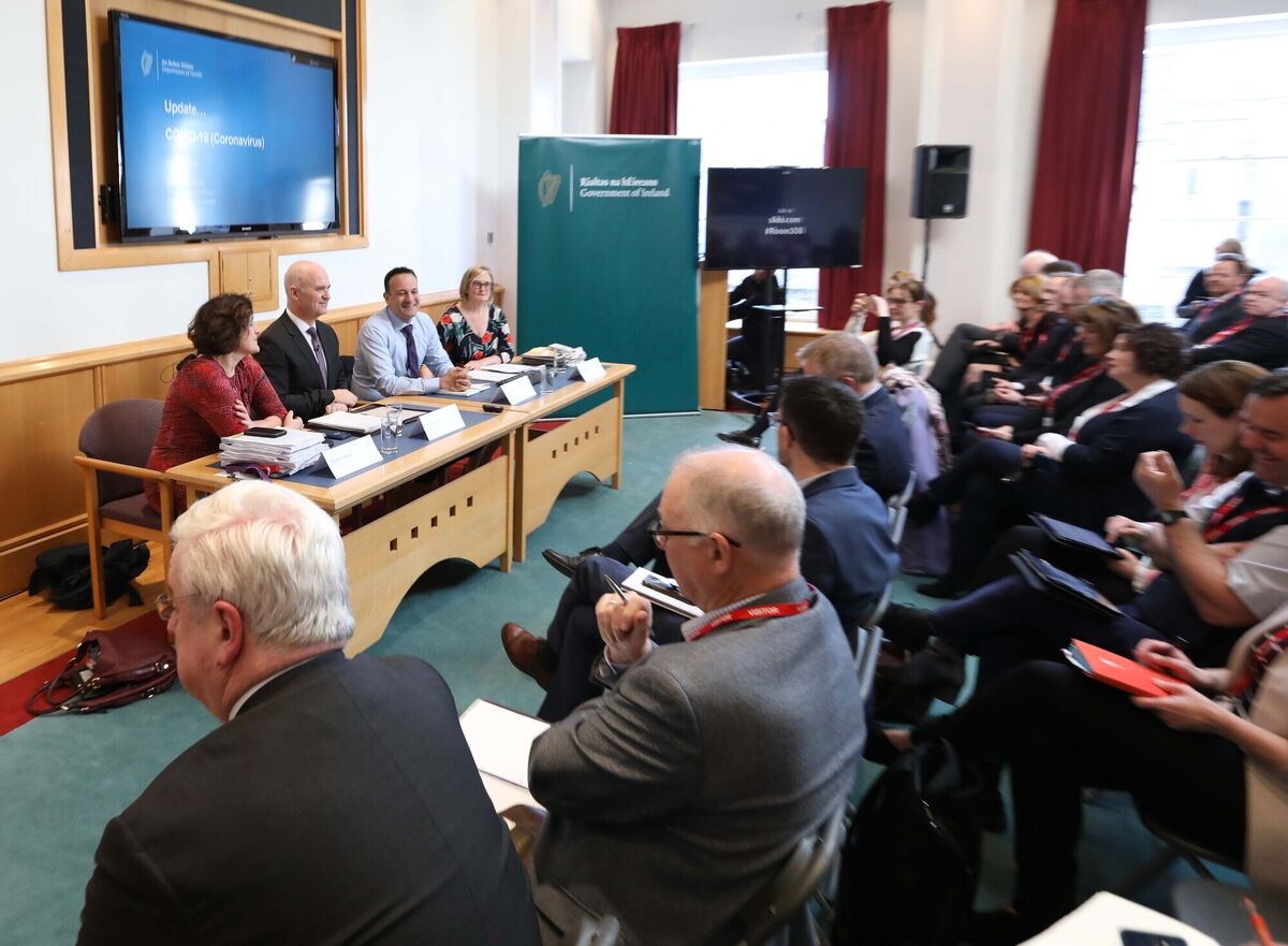 (Left to right) Deirdre Watters, Dr Tony Holohan, Leo Varadkar  and Elizabeth Canavan in Government Buildings in March 2020. There doesn’t seem to be much political interest in countering the view that everyone who makes decisions is in a suit. Photo: Sasko Lazarov / RollingNews.ie