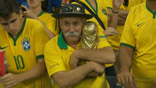 The story behind the saddest Brazil fan with the magnificent moustache