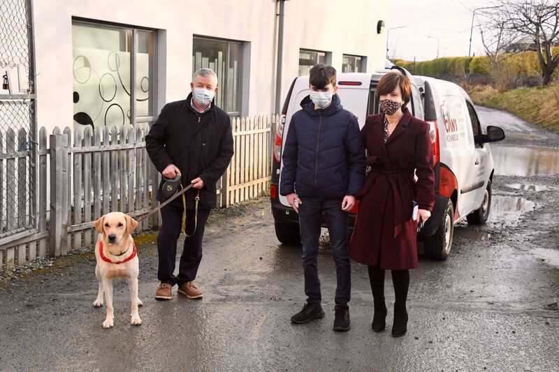 Pictured at today's ribbon cutting ceremony at Our Lady's Children's Hospital are Cian's family - his father, Enda; brother Shane; his mother, Evelyn and best pal Cooper.
