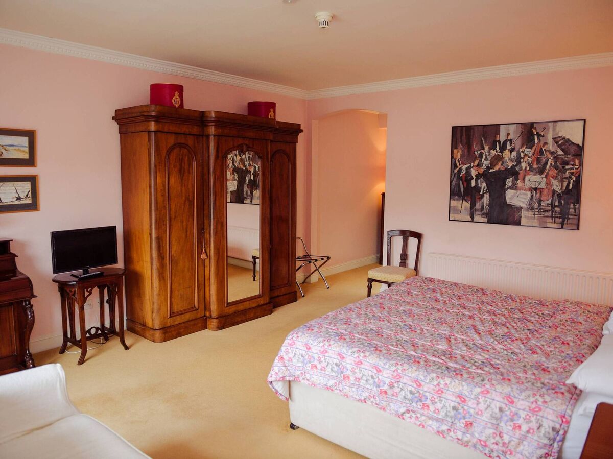 One of the 14 suites and bedrooms at Aherne's