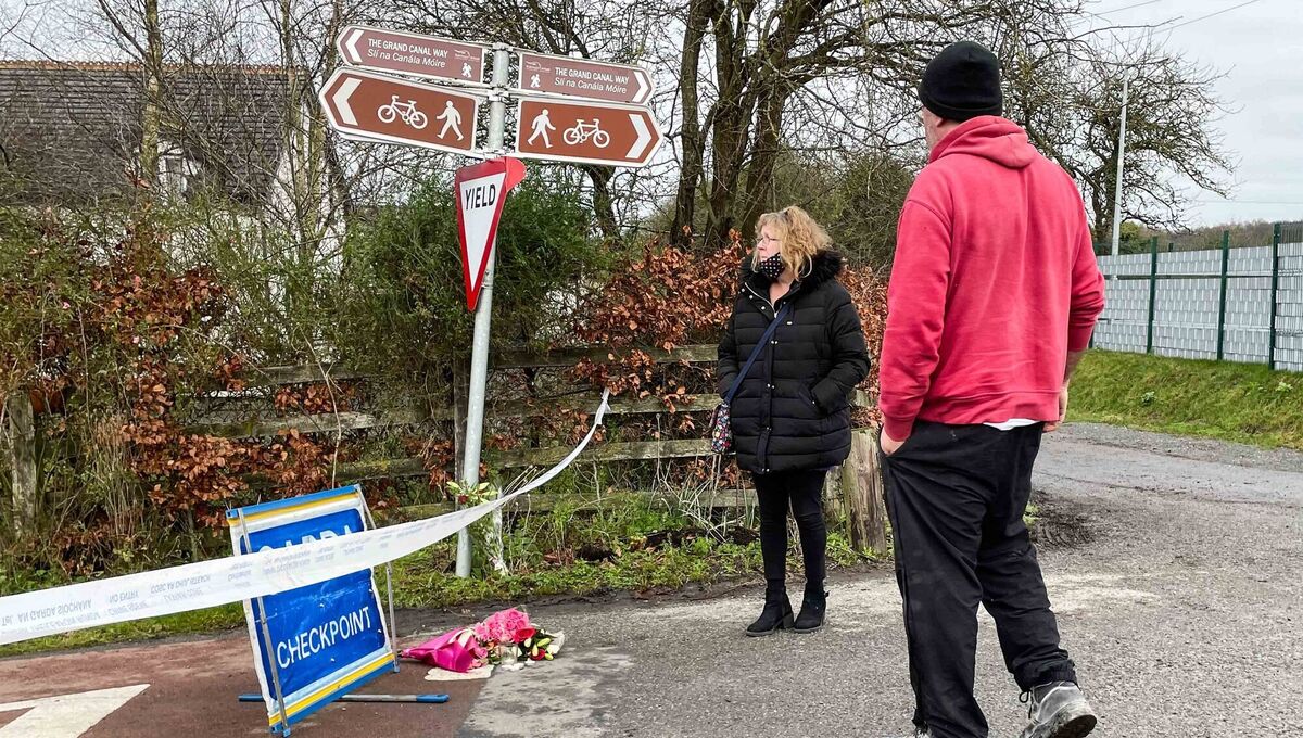  Members of the public lay flowers at the scene near the fatal assault on Ashling Murphy that occurred at about 4pm on Wednesday along the canal bank at Cappincur, Tullamore, Co Offaly. Picture: Eamonn Farrell / RollingNews.ie