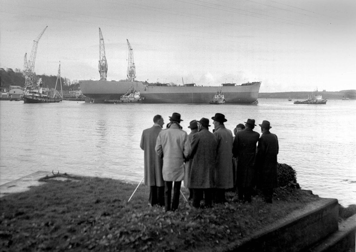 Onlookers near Monkstown view the launch of the Irish Rowan from Verolme Cork Dockyard in 1961 Onlookers near Monkstown view the launch of the Irish Rowan from Verolme Cork Dockyard in 1961