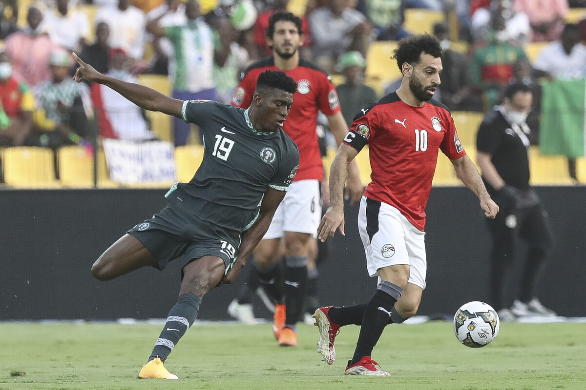 Egypt's Mohamed Salah, right, and Nigeria's Taiwo Awoniyi fight for the ball during the African Cup of Nations match on Tuesday. Picture: AP Photo/Footografiia