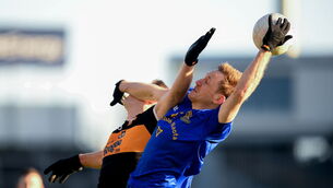 <p>16 January 2022; Sam Ryan of St Finbarr's in action against Michael O'Donnell of Austin Stacks during the AIB Munster GAA Football Senior Club Championship Final match between Austin Stacks and St Finbarr's at Semple Stadium in Thurles, Tipperary. Photo by Stephen McCarthy/Sportsfile</p>