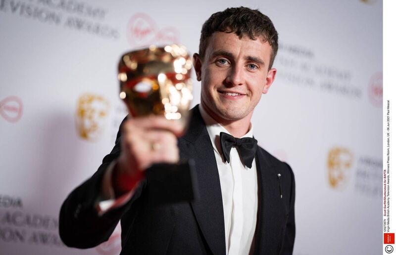 Paul Mescal poses for photographers with his Leading Actor award for his role in 'Normal People' backstage at the BAFTAs