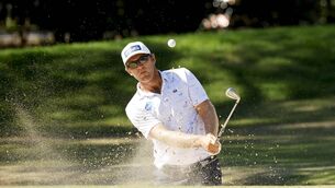 <p>Seamus Power of Ireland plays a shot from a bunker on the sixth hole during the final round of the Sony Open in Hawaii </p>