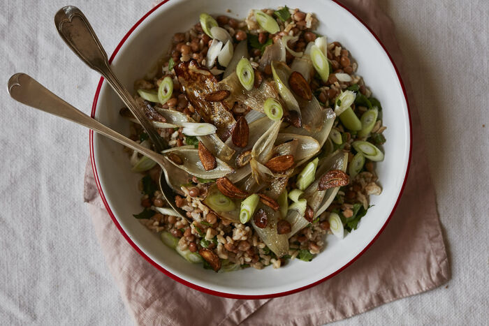 Brown rice and lentil pilaf with crispy garlic