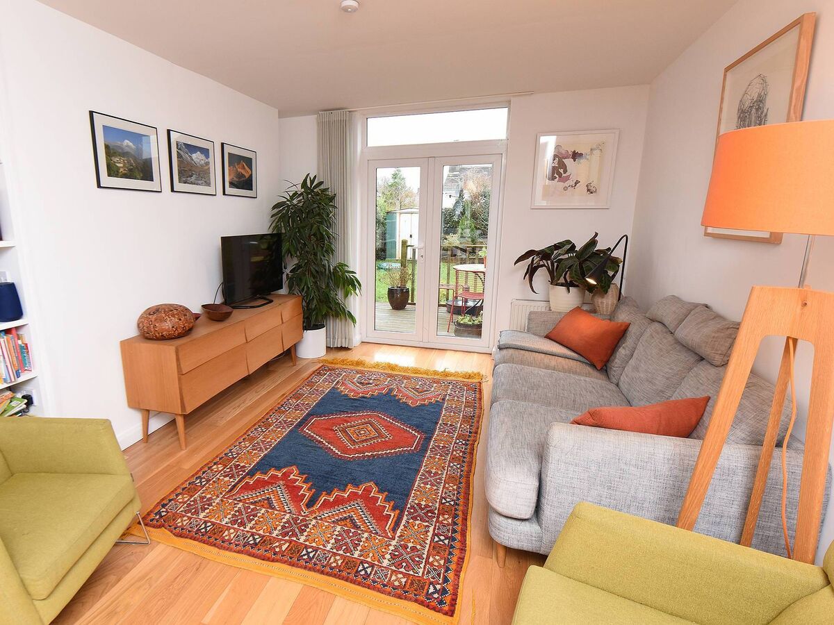 Two former reception rooms now joined into one larger one Two former reception rooms now joined into one larger one