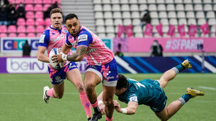 <p>Stade Francais Paris' Telusa Veainu escapes Alex Wootton of Connacht</p>