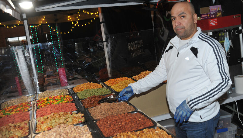 Qayss working at Shady Nuts outlet/shop at the Marina Market on Saturday. Picture: Larry Cummins