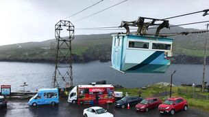 <p>The proposal approved by An Bord Pleanála would replace the current single-car system with a two-car desynchronised reversible cable car system capable of carrying 650 people an hour. Picture: Eamonn Farrell/RollingNews</p>