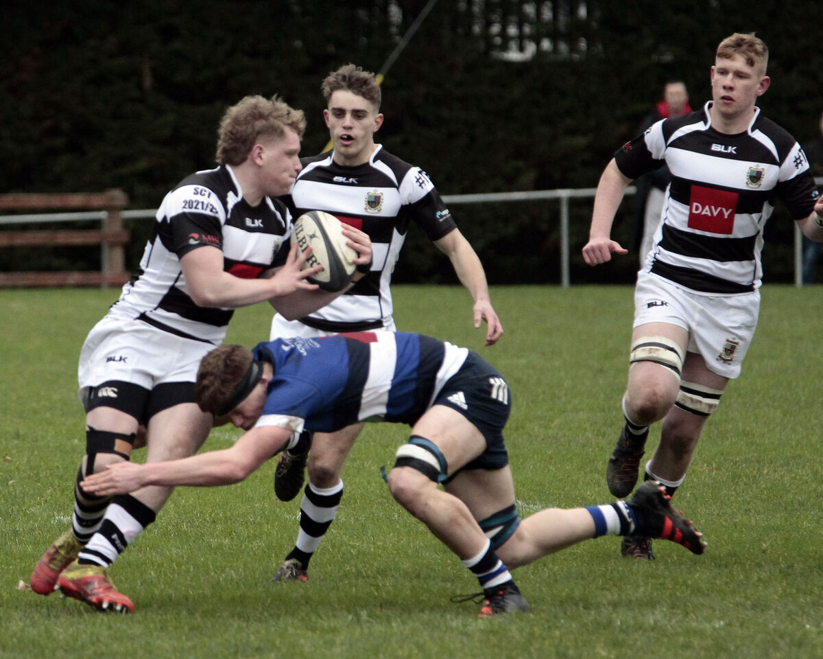 Sean Condon, PBC been tackled by Jamie Duggan, Crescent Comprehensive. Picture: Brendan Gleeson