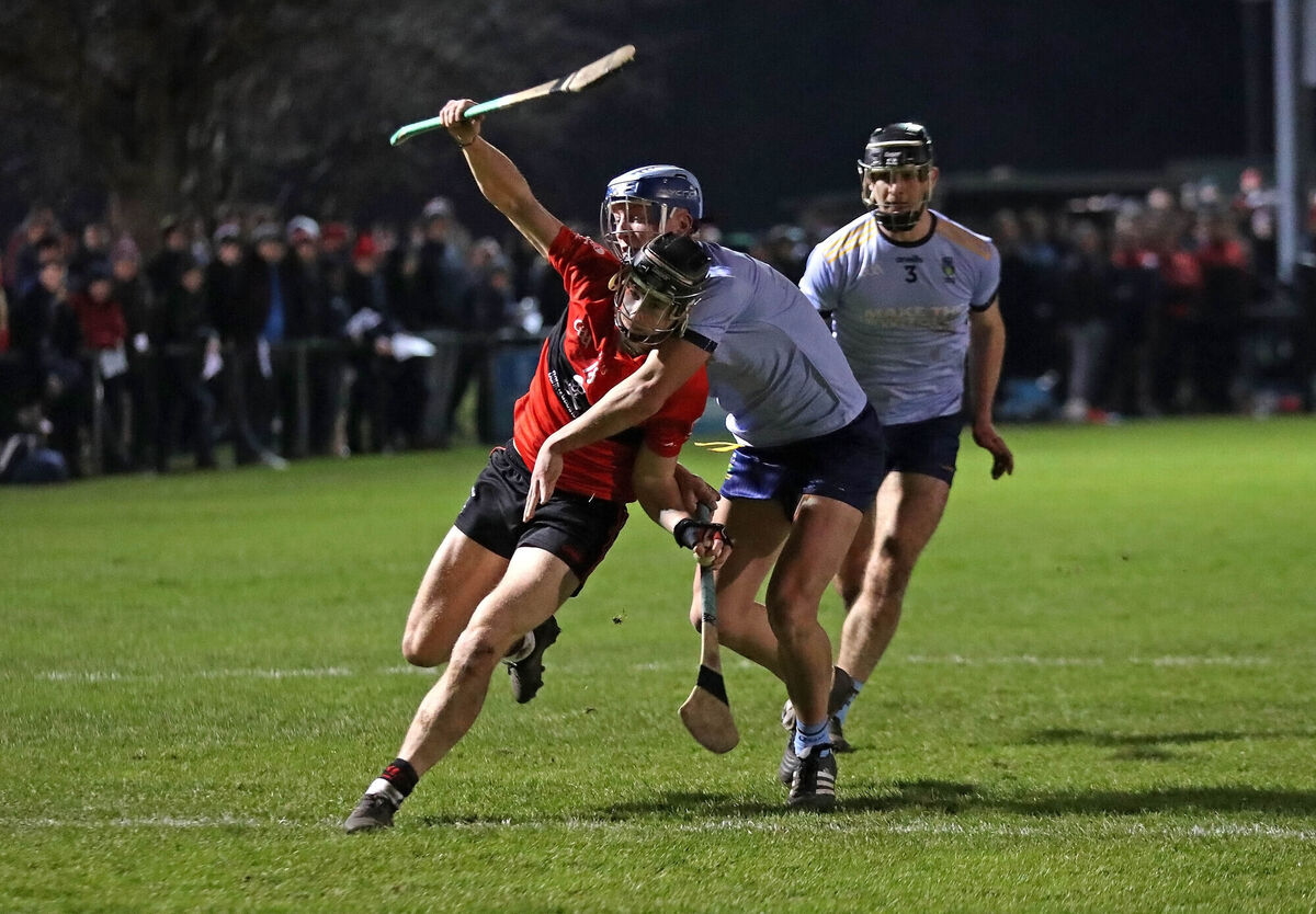  Simon Kenefick, UCC in action against Brian Sheehy, UCD. Picture: Jim Coughlan.