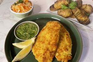 Chicken schnitzel with garlic, lemon and parsley butter