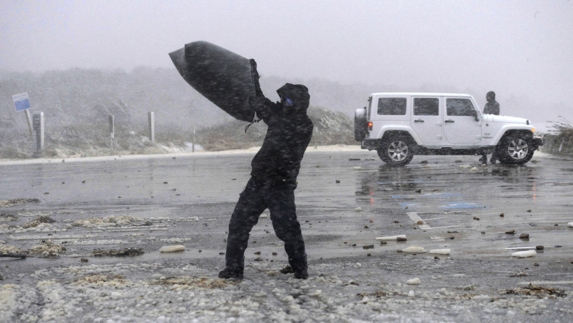 Winter storm lashes US east coast with deep snow and high winds