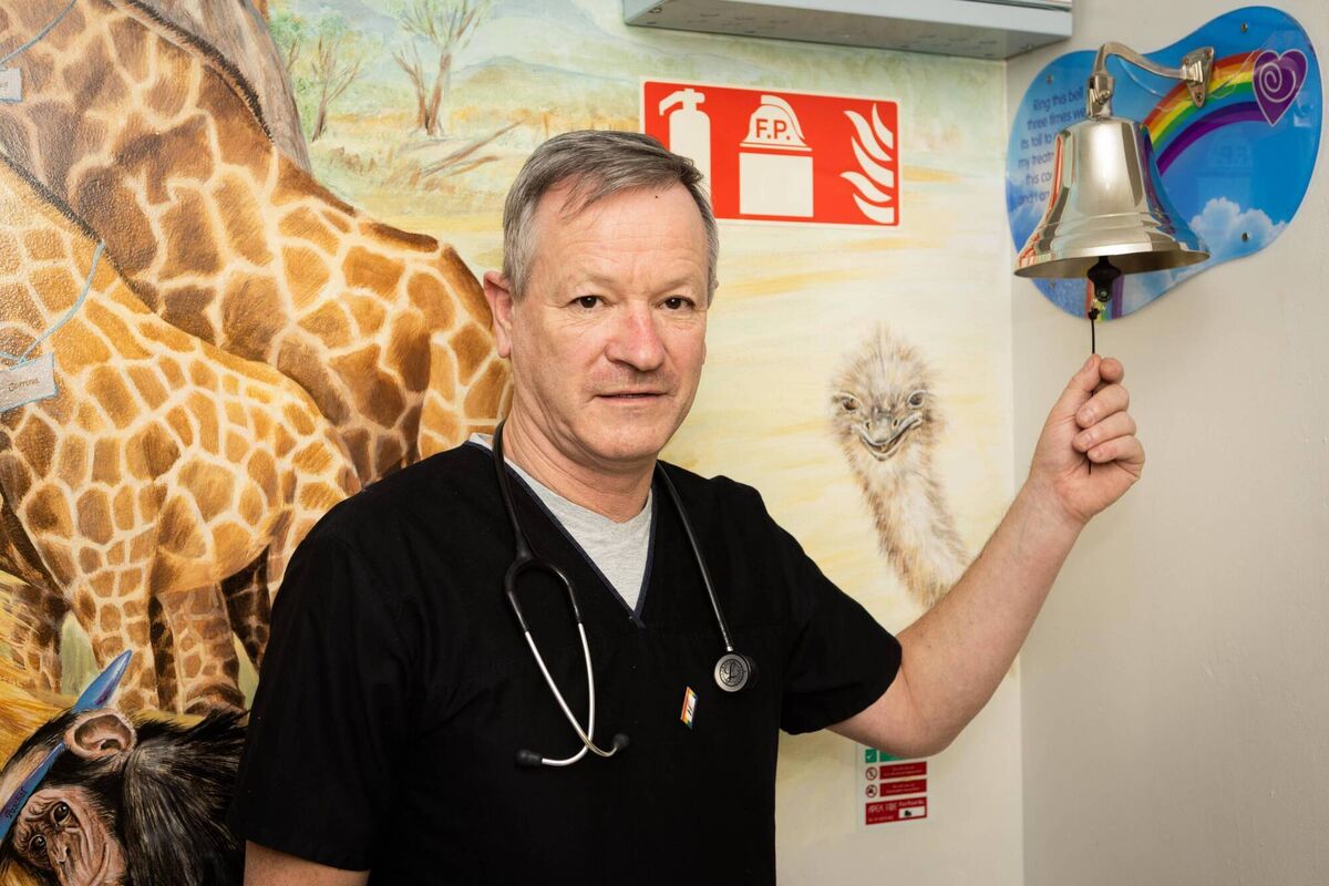 Professor Aengus O'Marcaigh rings the cancer-free bell at CHI Crumlin