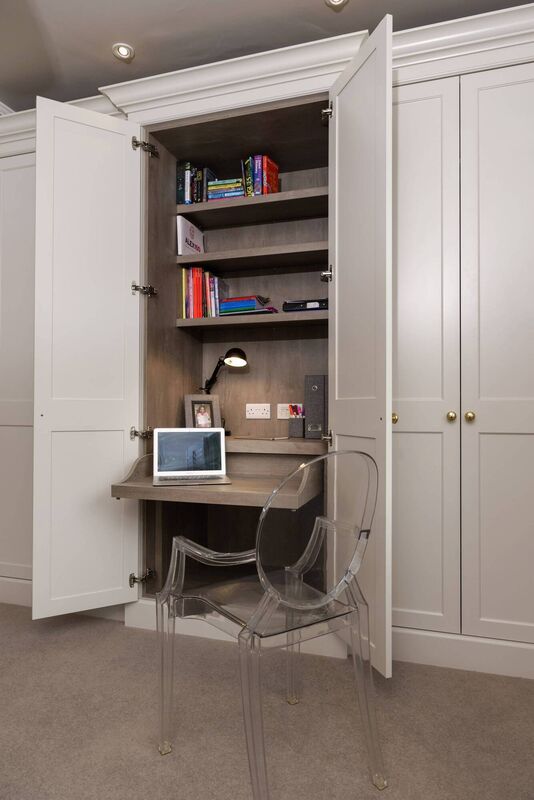  A bedroom workstation that can be hidden away, in a Dublin residence, by Capatina Bespoke Furniture, Dublin. 