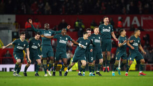 <p>Middlesbrough players celebrate winning the penalty shoot-out after the Emirates FA Cup fourth round match at Old Trafford (PA)</p>