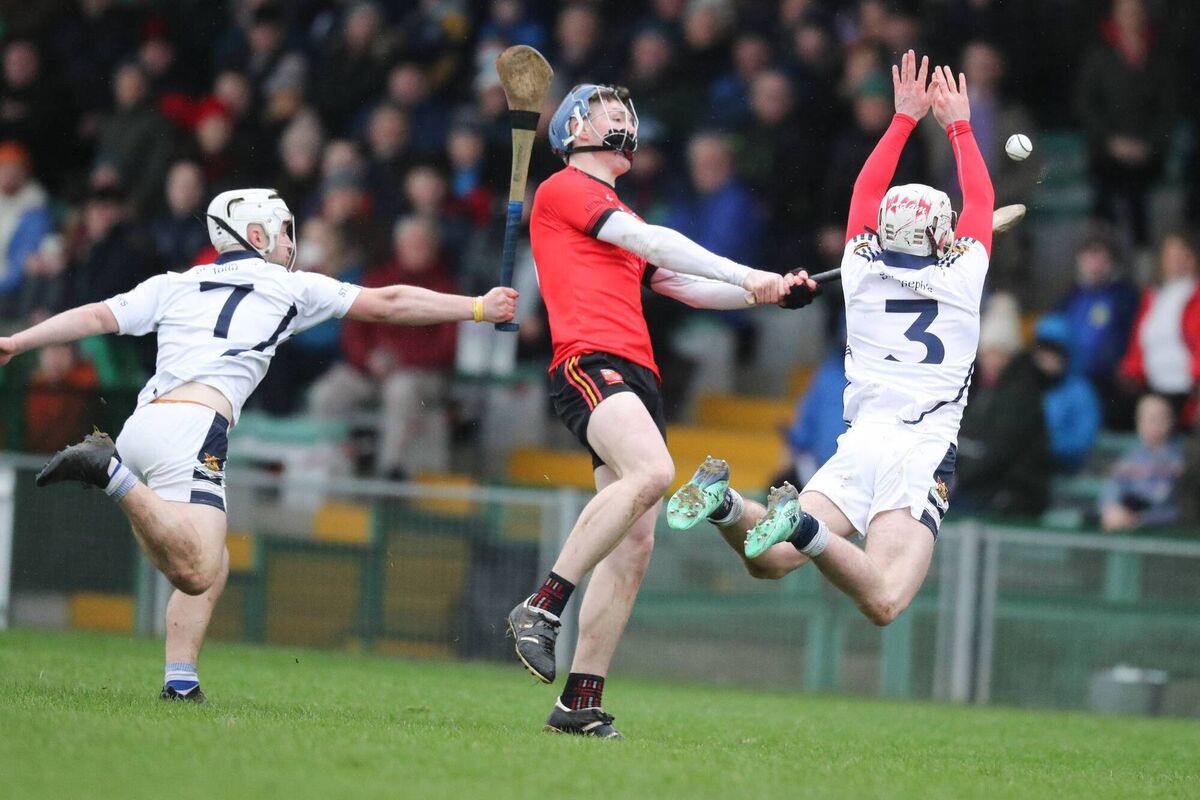 Shane O'Brien, Ard Scoil Ris joint captain shoots from the sideline with Adam Hogan and Oisin Clune defending for St Josephs Tulla. Picture: Keith Wiseman