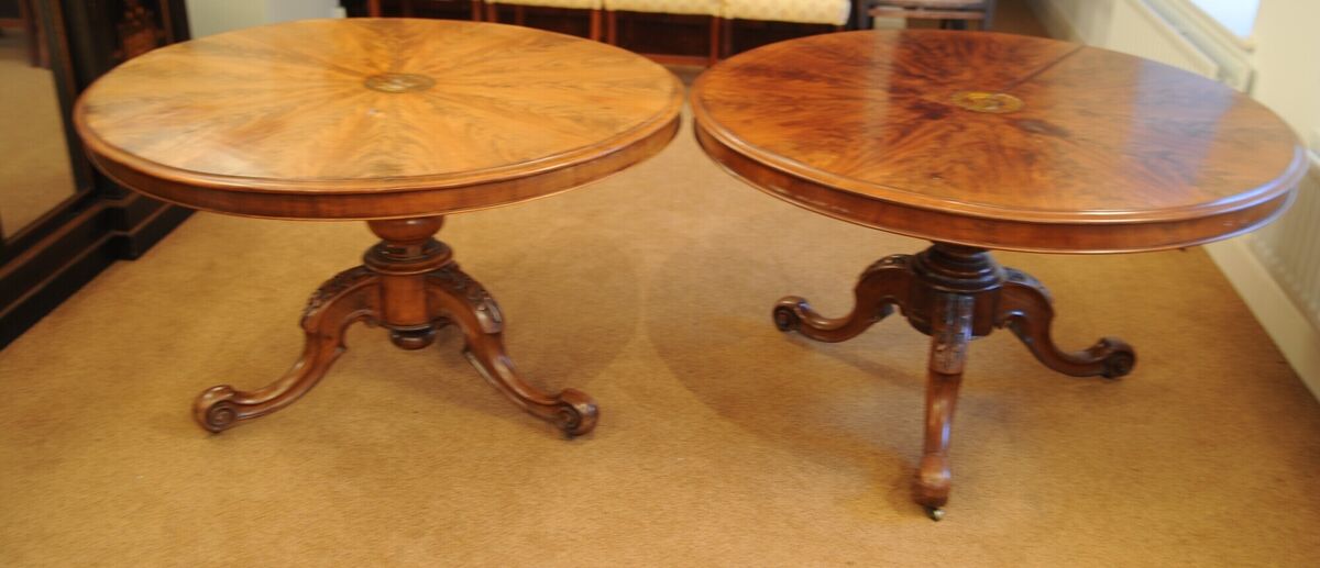 A pair of Victorian circular flame mahogany breakfast tables.