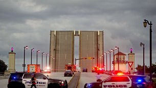 The bridge was closed to traffic following the incident (Meghan McCarthy/The Palm Beach Post via AP)