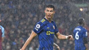 <p>RAIN DANCE: Cristiano Ronaldo looks on through the driving rain after coming on as a substitute in Manchester United’s draw against Burnley at Turf Moor. <span class="contextmenu emphasis CaptionCredit">Picture: Paul Ellis/AFP via Getty Images</span>
            </p>