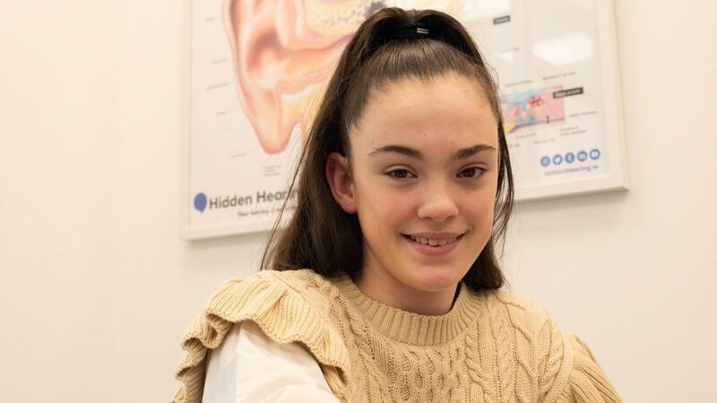 Harpist Úna Walsh inspires other children to wear their hearing aids