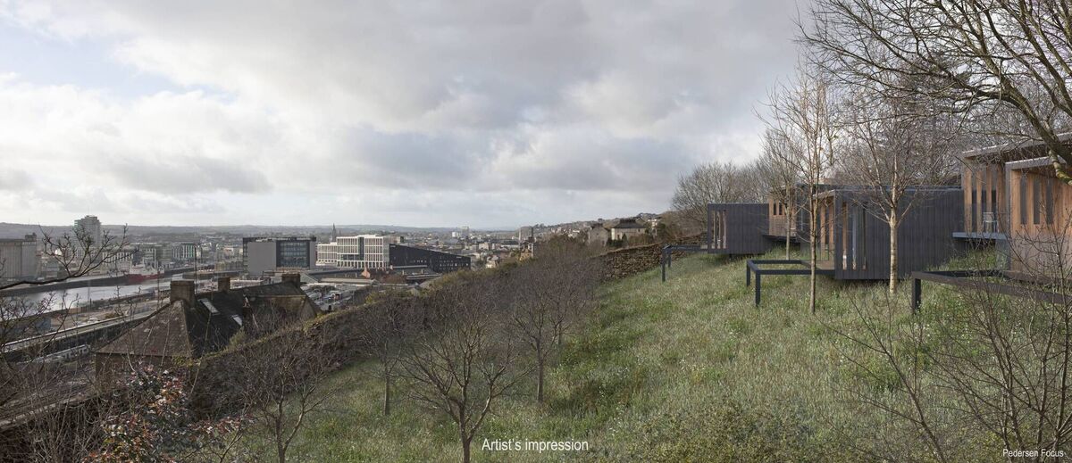 Cantilevered woodland suites with city and quays backdrop
