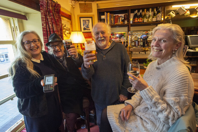 Rachel O'Donnell-Barry with her first customers at the Hi-B in Cork since the Covid closedown, Hans Neff, Joe Moynihan, and Lourdes Mackey. Picture: Dan Linehan Rachel O'Donnell-Barry with her first customers at the Hi-B in Cork since the Covid closedown, Hans Neff, Joe Moynihan, and Lourdes Mackey. Picture: Dan Linehan