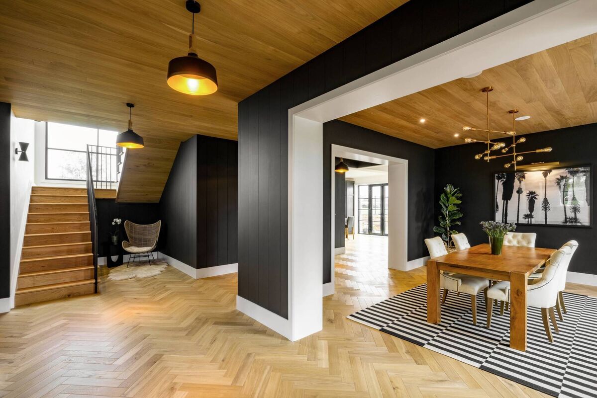 The open-plan interiors flow behind the traditional Georgian-style facade. 