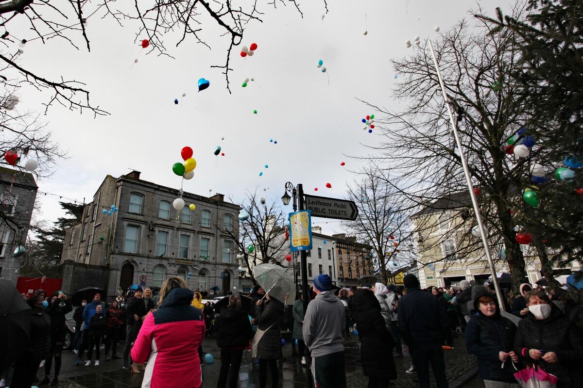 Grieving friends and classmates of 12-year-old Wiktor Chojecki and members of the wider community releasing the balloons in his memory at the Square, Newcastle West, Co Limerick. Picture: Brendan Gleeson Grieving friends and classmates of 12-year-old Wiktor Chojecki and members of the wider community releasing the balloons in his memory at the Square, Newcastle West, Co Limerick. Picture: Brendan Gleeson