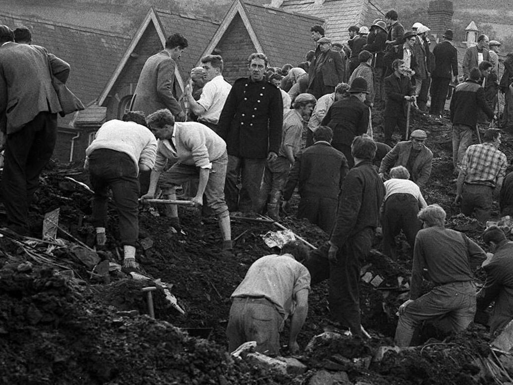 An image from Aberfan in 1966, with rescue workers trying to reach children trapped in Pantglas Junior School after waste from a local coalmine caused a landslide. Picture: PA Wire An image from Aberfan in 1966, with rescue workers trying to reach children trapped in Pantglas Junior School after waste from a local coalmine caused a landslide. Picture: PA Wire