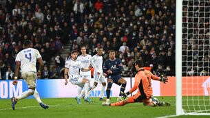 <p>PSG’s Kylian Mbappé scores the last-minute winning goal past Real Madrid’s Thibaut Courtois in the Champions League clash at Parc des Princes. <span class="contextmenu emphasis CaptionCredit">Picture: Shaun Botterill/Getty Images</span>
            </p>