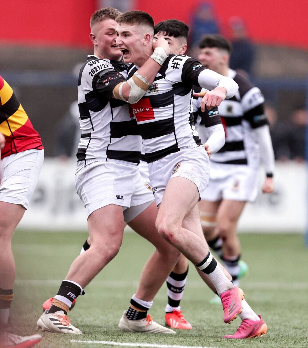 WE'VE DONE IT: Ben O’Connor celebrates at the final whistle with Danny Sheahan.