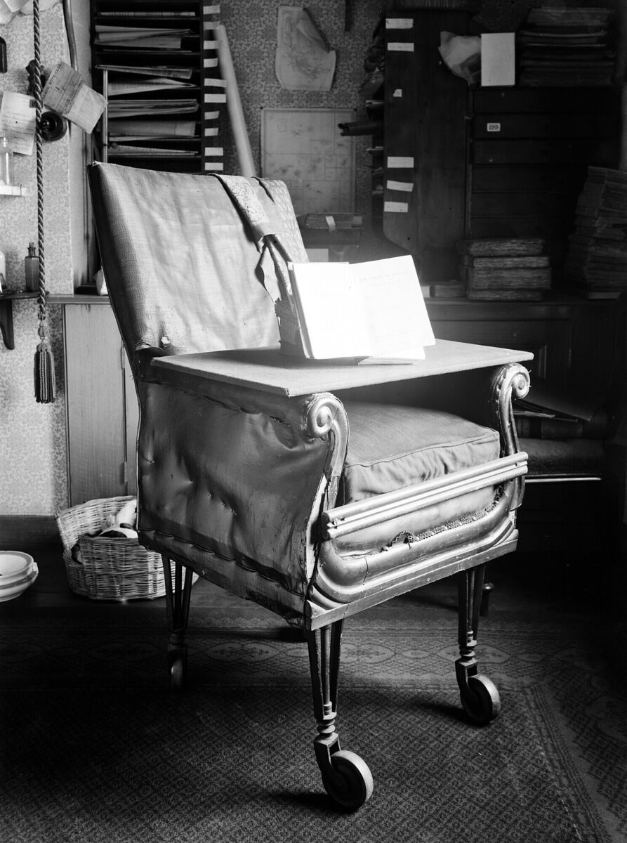 Charles Darwin's scooting William IV chair in Down House, South East London, with attached castors to reach his specimens while writing up papers. Rolled out in the early 1840s