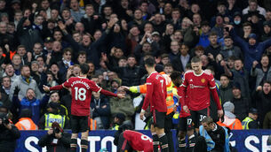 Anthony Elanga (bottom) was struck by a coin (Mike Egerton/PA)