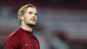 <p>LIVERPOOL, ENGLAND - DECEMBER 22: Goalkeeper, Caoimhin Kelleher of Liverpool looks on prior to the Carabao Cup Quarter Final match between Liverpool and Leicester City at Anfield on December 22, 2021 in Liverpool, England. (Photo by Naomi Baker/Getty Images)</p>