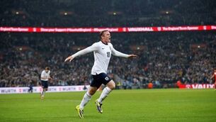 Rooney named new England captain