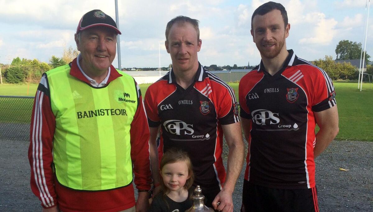 Pierce Higgins (centre) with his daughter Erin in 2015 pictured with his brother Keith and Dad Pete who was manager of the Ballyhaunis team after they won the Mayo SHC final. Pierce Higgins (centre) with his daughter Erin in 2015 pictured with his brother Keith and Dad Pete who was manager of the Ballyhaunis team after they won the Mayo SHC final.
