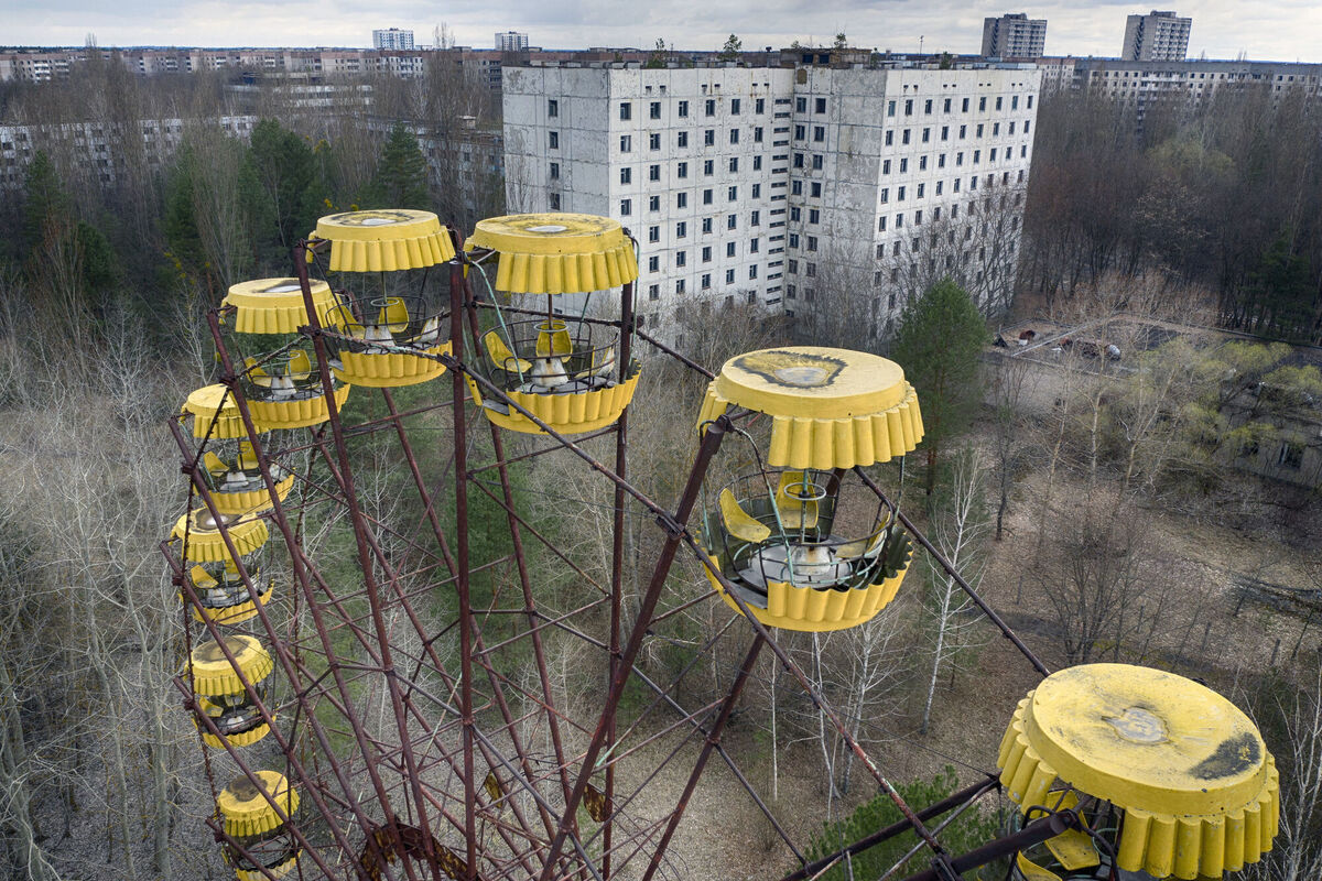 An abandoned Ferris wheel stands in the park in the ghost town of Pripyat, Ukraine, close to the Chernobyl nuclear plant, on April 15, 2021. Picture: AP Photo/Efrem Lukatsky, File