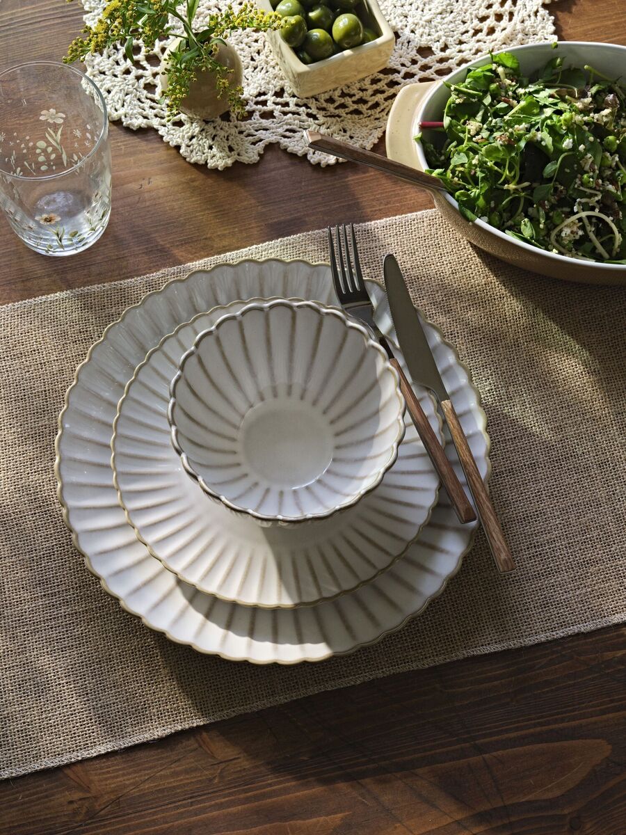  Penneys Scalloped range of ceramic dishes including a dinner plate (€6), bowl (€4.50) and side plate (€4.50), have a special occasion feel for tablescaping projects.