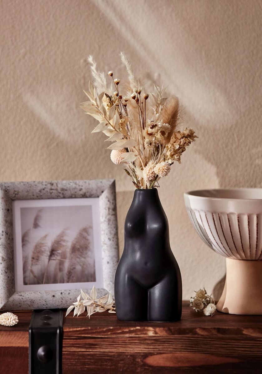  Penneys Shelfie range includes the small Female Form orrnament (€3) and the Speckle Effect square frame (€1.50).