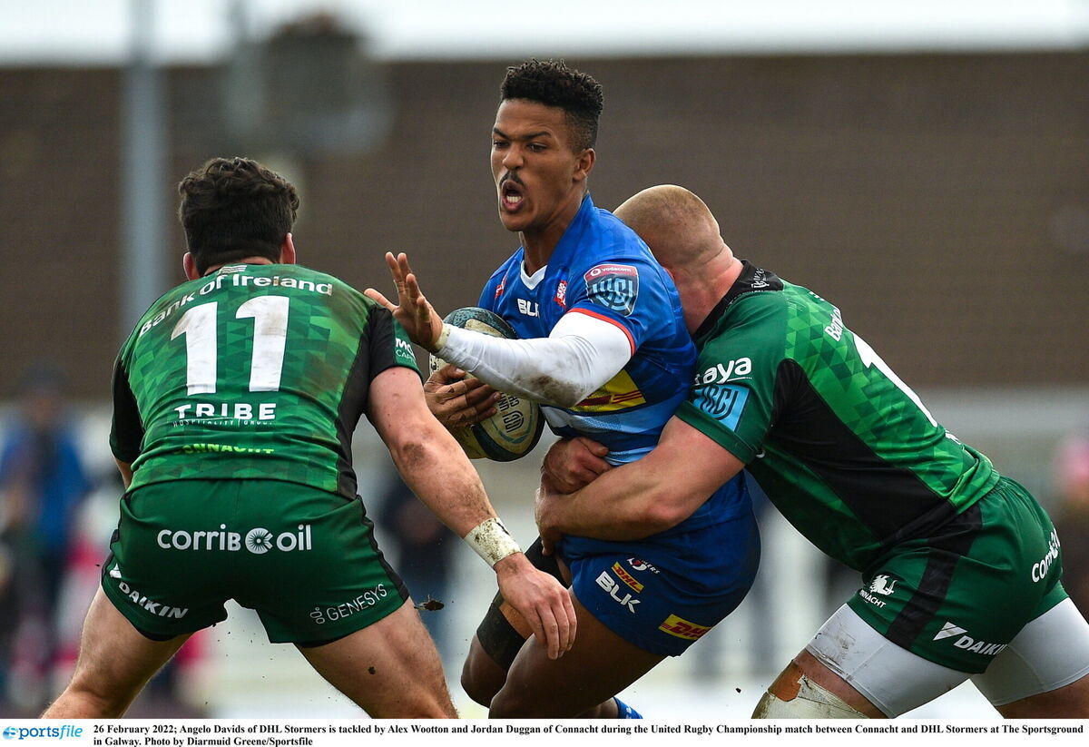 Angelo Davids of DHL Stormers is tackled by Connacht's Alex Wootton and Jordan Duggan at The Sportsground in Galway. [ic: Diarmuid Greene/Sportsfile