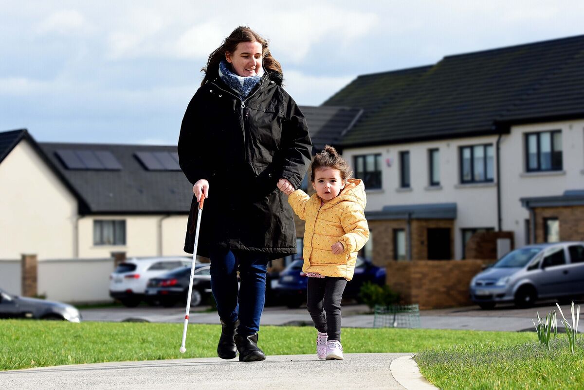 Jade McCormack, who is visually impaired, with her two-year-old daughter Sadhbh Lily near their home in Balbriggan, Co Dublin. Photograph Moya Nolan Jade McCormack, who is visually impaired, with her two-year-old daughter Sadhbh Lily near their home in Balbriggan, Co Dublin. Photograph Moya Nolan