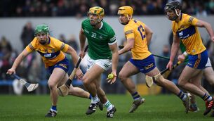 <p>23 January 2022; Dan Morrissey of Limerick handpasses the sliothar to a teammate during the 2022 Co-op Superstores Munster Hurling Cup Final match between Limerick and Clare at Cusack Park in Ennis, Clare. Photo by Ray McManus/Sportsfile</p>