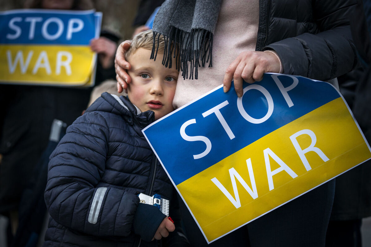 People take part in the Standing In Solidarity With Ukraine vigil on The Mound, Edinburgh. Picture: Jane Barlow/PA Wire People take part in the Standing In Solidarity With Ukraine vigil on The Mound, Edinburgh. Picture: Jane Barlow/PA Wire