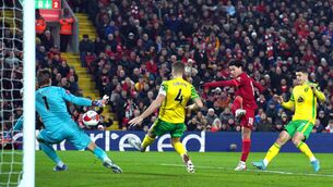 <p>Takumi Minamino (right) scores Liverpool's first goal during the FA Cup fifth-round win at Anfield. Picture: PA</p>