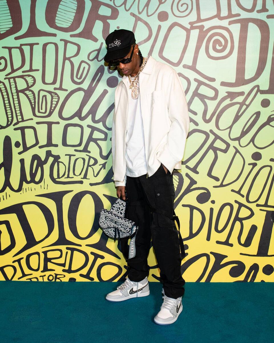 Nike: Jordan Brand Family Member, Travis Scott, unveiled Air Jordan I High OG Dior at Dior's Pre-fall 2020 show in Miami Nike: Jordan Brand Family Member, Travis Scott, unveiled Air Jordan I High OG Dior at Dior's Pre-fall 2020 show in Miami